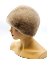 ladies hat with fur ball