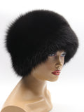 Barbara black fur hat in arctic fox, front left angle with fur over the ear tops