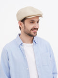 Side profile beige linen newsboy cap soft straight visor