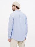 Back view beige linen newsboy cap showing 8-panel crown