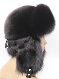 Black arctic fox and mink hat from behind, right side, flaps fastened at the back