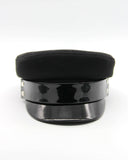 Black cashmere Breton cap with patent visor front view on white background