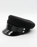 Side profile of black Breton cap showing lacquered patent brim detail