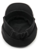 Three-quarter view of black cashmere captain cap with glossy patent visor