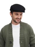 Torso side angle man wearing elegant black flat cap with olive bomber jacket