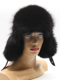 Black fox fur hat with long ear flaps down and snap chin strap, right three-quarter view