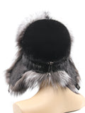 Black fur hat from behind with ear flaps raised and silver fox trim around the base
