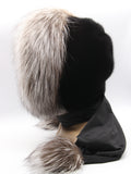 Close front view black fur hood on mannequin with silver fox guard hairs fanning around face opening