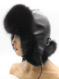 Left profile of black leather aviator hat with arctic fox brim and flaps tied back