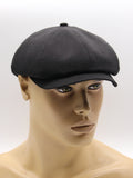 Black linen newsboy cap mannequin front view structure handcrafted