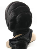 Back view black mink black suede striped fur hat hood showing full monochrome alternating stripe pattern
