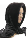 Black natural mink fur hat hood with black jersey shawl and matching mink pompons on female model, front view