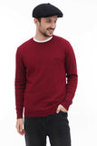 Torso front angle man in black wool newsboy cap with burgundy sweater casual smile