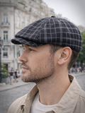 Black plaid baker boy cap mens lifestyle outdoor city setting