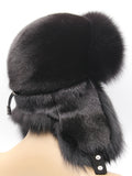 Back view of black ushanka showing smooth crown, fox brim and drawstring cord
