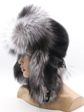 Black ushanka with tall silver fox brim and fox ear flaps, left side view on mannequin