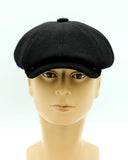 Black wool newsboy cap three-quarter angle view