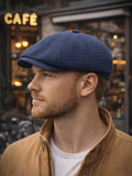 Blue check cotton newsboy hat men three quarter view city street