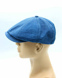 Blue linen Gatsby cap side profile mannequin close-up