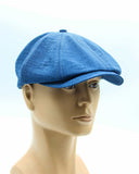 Blue linen Gatsby hat side angle on mannequin
