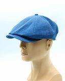 Blue linen newsboy cap back view on mannequin
