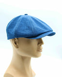 Blue linen newsboy cap front view on mannequin
