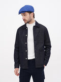 Side profile blue linen newsboy cap showing visor angle and crown shape