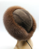 Back three-quarter view of brown fox hat showing panel-stitched suede crown