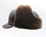 Brown sheepskin visor cap side view leather bill