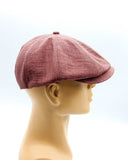 Burgundy linen Gatsby cap back view on mannequin