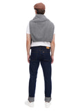 Back view of man wearing cappuccino flat cap showing traditional newsboy cap shape full body