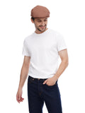 Man wearing traditional cappuccino flat cap torso view side angle casual stance