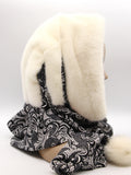 Cream mink fur hat hood cowl front view on mannequin showing ivory mink hood and black patterned knit cowl