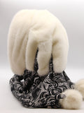 Close view cream mink fur hat hood showing dense natural ivory mink pile and clean face opening edge