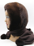 Dark chocolate natural mink fur hat hood with brown fabric scarf and matching mink pompons on mannequin, front view
