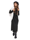 Front full body view woman in dark grey cashmere newsboy cap black dress