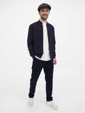 Man wearing dark grey wool newsboy cap full body front standing