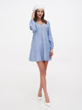 French style white beret for women, three-quarter front view with blue V-neck dress