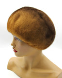 Golden brown mink beret right profile view showing natural fur sheen and mink flower petal structure