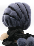 Close view graphite mink black suede stripe fur hat hood showing contrast between mink pile and flat black suede surfaces
