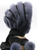 Three-quarter back view graphite mink black suede striped fur hat hood with scarf ties and graphite mink pompons