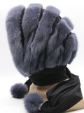 Three-quarter view graphite mink black suede striped fur hat hood showing dark contrast stripe texture