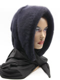 Graphite mink fur hat hood shawl on female model front view showing dark charcoal mink and wide dark fabric drape across shoulders