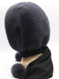 Close view graphite mink hood showing dense flat dyed mink pile in deep charcoal-grey tone