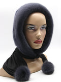Three-quarter view graphite mink hood showing matte charcoal-grey mink pile and dark coordinated fabric scarf