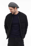 Back view man in graphite grey tweed flat cap showing construction with black bomber