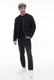 Torso front angle man in graphite grey tweed flat cap with black bomber jacket