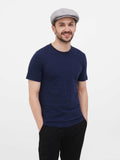 Man wearing gray linen cap front view slouchy crown