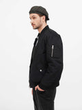 Green newsboy cap front side back angles and slouchy fit details
