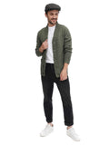 Man wearing green tweed flat cap standing casual pose with olive jacket front view